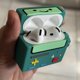 thumbnail image 3 of Funda de silicona para AirPods 4 con kit de limpieza, diseño retro de videojuego, 3 of 7