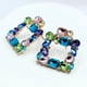 thumbnail image 4 of Aros De Fiesta Apegados Cuadrados Con Circonitas De Colores Azul, 4 of 6