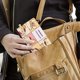 thumbnail image 5 of Pompompurin Porta Pasaporte y Cartera de Viaje Premium de Cuero PU, Funda de Pasaporte Bloqueo RFID con Ranuras para Tarjetas de Crédito, Estuche para Libro de Pasaporte para Familia 10cm × 15cm, 5 of 6