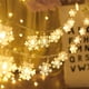 thumbnail image 1 of Luces navideñas, guirnalda de luces con forma de copo de nieve de 5 m, 40 luces LED, funciona con pilas, impermeable, para Navidad, jardín, patio, dormitorio, fiesta, decoración, iluminación interior, 1 of 7