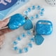 thumbnail image 5 of Funda Protectora de Mármol para AirPods con Carcasa Suave y Cadena Adherida, 5 of 9