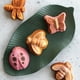 thumbnail image 4 of Bundt Pan Nordic Ware Kids Collection, aluminio fundido con forma de caramelo, 1,2 L, 4 of 6