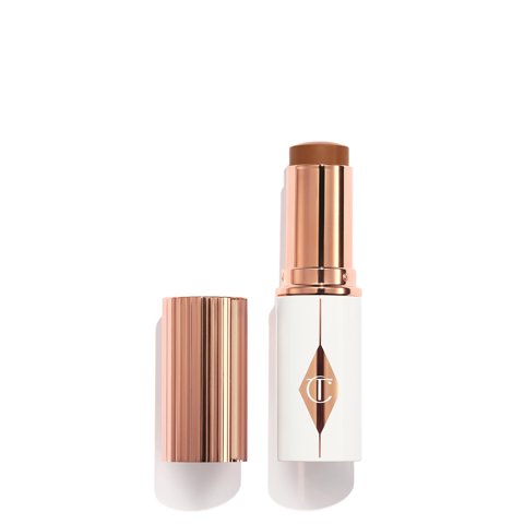 Base En Barra Charlotte Tilbury Unreal Skin Tint 14 Deep