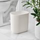 thumbnail image 3 of iDesign Cubo de Basura Pequeño y Delgado de Plástico para Baño, Blanco Coco, 3 of 8