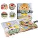 thumbnail image 1 of Libro de actividades Taf Toys Montessori para 1 a 3 años con 12 Activ, 1 of 9