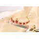 thumbnail image 2 of Conjunto de joyas HEIKLN Descendant Gold Tiara con corona de corazón rojo, 2 of 7