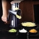 thumbnail image 3 of Reja rotativa de queso con manija, rejilla manual de cortes de verduras con 5 cuchillas desmontables de acero inoxidable, rejilla redonda cortadora de mano de manivela para cocina con caja d, 3 of 3