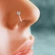 thumbnail image 1 of Aro para la nariz de plata con cristal transparente y flor fina pequeña - Aro para la nariz de cristal brillante, 1 of 3