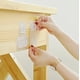 thumbnail image 5 of Pack 10 Ganchos De Pared Adhesivos De Doble Cara (20 Piezas), 5 of 7