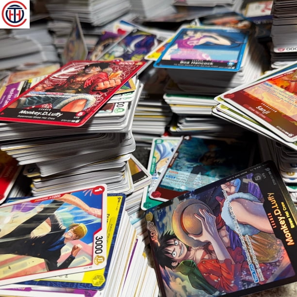 Caja de Refuerzo del Juego de Cartas Coleccionables One Piece con 100 Cartas + 7 Cartas Holográficas