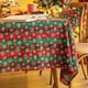 thumbnail image 2 of Mantel de tela redonda roja de Navidad de 47,2 pulgadas - cubierta de mesa de comedor de vacaciones resistente sin hierro (copos de nieve de rejilla roja y verde), 2 of 3