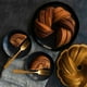 thumbnail image 3 of Bundt Pan Nordic Ware, 75 aniversario, trenzado Premier Gold Nordic Ware NA, 3 of 3