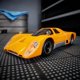 thumbnail image 3 of Coche Hot Wheels McLaren M6GT naranja, modelo a escala 1:64 de fundición a presión con ruedas Real Riders, 3 of 6