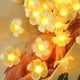 thumbnail image 4 of Guirnalda de luces LED artificiales de plumeria, estilo hawaiano de espuma, con alimentación USB, ideal para dormitorio, cumpleaños, bodas, fiestas en la playa., 4 of 8