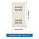 thumbnail image 2 of Uxcell 100 piezas de etiquetas de costura hechas a mano con amor, etiquetas bordadas para coser en prendas de vestir negras de 1.18" de largo, 2 of 7