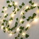 thumbnail image 1 of Guirnalda de luces solares, guirnalda de hiedra artificial de 10 m, plantas colgantes con 100 LED, luces solares para exteriores, 8 modos, hojas de hiedra artificiales impermeables, 1 of 5