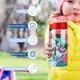 thumbnail image 5 of Navidad: Bienvenido a Villa QuiénBotella de Agua con Tapa Pop Top de Un Toque, Acero Inoxidable, a Prueba de Fugas, para Deportes, Botella Infantil rosa 12 oz, 5 of 6
