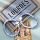 thumbnail image 4 of Pulsera de Agua Bendita Plateada con Motivo Floral Azul, 4 of 6
