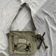 thumbnail image 1 of Upgrade Your Preppy Style with Our Trendy Shoulderbag - Perfect for Students! Featuring a Cute Cartoon Decor and Spacious Interior with Plastic Buckle and Zipper Closure., 1 of 5