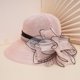 thumbnail image 1 of Women's Wide Brim Straw Bucket Hat with Floral Mesh Fascinator for Church, Weddings, and Beach Sun Protection - Perfect Valentine's Gift, 1 of 5