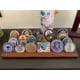thumbnail image 5 of Exhibidor de Monedas DisplayGifts de 4 Filas en Madera de Nogal, 5 of 7