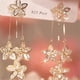 thumbnail image 4 of Pendientes de flor de ciruelo con borlas de circonita - Pendientes con flecos de flores brillantes para mujeres, Pendientes colgantes Pendientes de moda Joyería para mujeres, 4 of 7