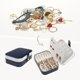thumbnail image 2 of Caja de accesorios de viaje REGALWOVEN, pequeño organizador de accesorios de cuero PU, soporte de exhibición de almacenamiento para regalos de mujeres Azul Blanco, 2 of 7