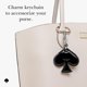 thumbnail image 4 of Llavero con colgante AirTag forma de espada de kate spade new york, 4 of 9