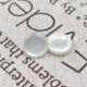 thumbnail image 1 of Botones Semicirculares de Resina Suxumhao 16L Blanco Claro 100 Piezas, 1 of 3