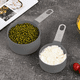 thumbnail image 4 of Tazas medidoras apilables con mango de acero inoxidable para medir ingredientes secos y líquidos, 4 of 5