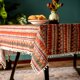 thumbnail image 1 of Mantel SUTAVIA 152 cm × 264 cm Rojo con Borlas de Pompones, 1 of 7