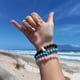 thumbnail image 2 of Pulsera elástica Fahlo de seguimiento de pingüinos, talla única, color verde agua, 2 of 7