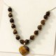 thumbnail image 3 of Collar de Ojo de Tigre para Mujer, Cadena de Cuentas de Piedra Marrón Natural con Colgante de Corazón de 3.5 Cm, Cuentas de 7 Mm, Joyería de Moda para Uso Diario y Regalo, 3 of 5