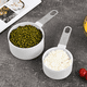 thumbnail image 4 of Tazas medidoras apilables con mango de acero inoxidable para medir ingredientes secos y líquidos, 4 of 5