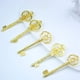 thumbnail image 5 of Key Makhry Mixed 20 con acabado dorado extra grande para boda, 5 of 6