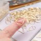 thumbnail image 4 of sujetapapeles DEEDYGO Gold Teardrop de acero inoxidable, 250 unidades, 4 of 6