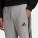 thumbnail image 5 of Pantalones deportivos adidas Standard Essentials de forro polar con 3 rayas para hombre, 5 of 7