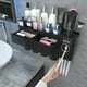 thumbnail image 1 of Soporte para cepillos de dientes iHave para 4 tazas montado en la pared con dispensador, 1 of 3