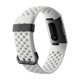 thumbnail image 4 of Monitor de actividad física Fitbit Charge 3 SE, silicona blanca y grafito, talla única (correas S y L incluidas), 1 unidad (paquete de 1), 4 of 9
