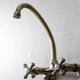 thumbnail image 3 of Grifo de cocina Kingston Brass Kingston de montaje en pared, latón antiguo, 3 of 6