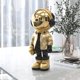 thumbnail image 2 of Escultura Dosker Astronaut Spaceman, poliresina dorada, 35 cm, 2 of 7