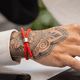 thumbnail image 2 of Pulsera cordón rojo con acero ajustable, 2 of 3