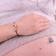thumbnail image 2 of Brazalete Llamador de ángeles plateado 18, 2 of 3