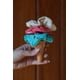 thumbnail image 5 of Kit Raíz | Cintillo + Muñequeras + Pétalos desmaquillantes + Scrunchies, 5 of 5