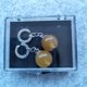 thumbnail image 2 of Pendientes SSBeauty Man con forma de bola de acero inoxidable, clip amarillo, 2 of 3