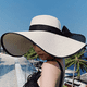 thumbnail image 5 of Sombrero de paja con lazo grande para mujer, gorra de playa grande, flexible, plegable y enrollable, sombrero para el sol, gorra de playa de verano con protección UV., 5 of 5