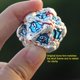 thumbnail image 3 of Dados DNDWoW D20 Calavera 3,1 cm Plateado/Rojo/Azul, 3 of 7