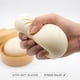 thumbnail image 2 of Pelota antiestrés Squishies Crossunx Dumpling blanco con vaporera, 2 of 8
