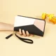 thumbnail image 4 of Cartera de mano para mujer, larga, con costuras en contraste de color, cremallera y borlas, de gran capacidad, para teléfono móvil, 4 of 5