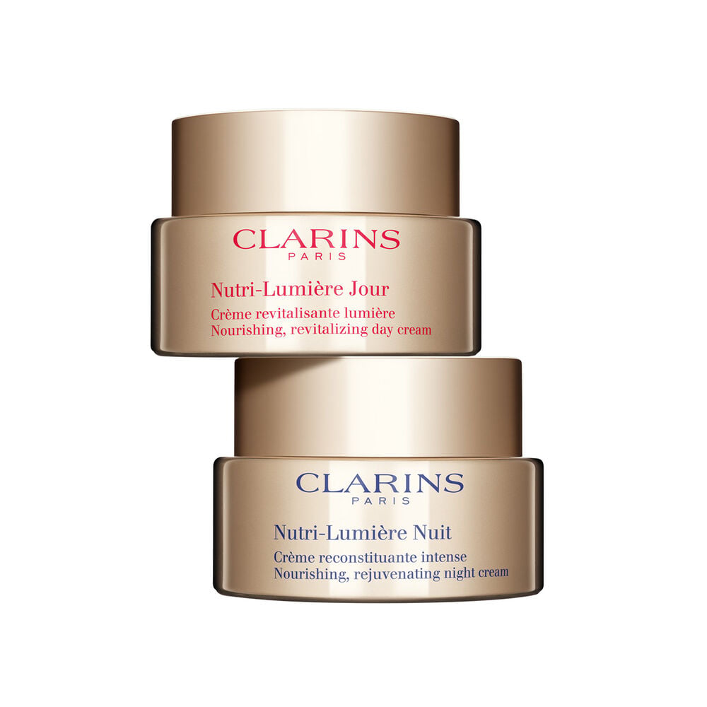 thumbnail image 1 of Set Nutritivo Iluminador Clarins Nutri-Lumière Day & Night Crema Duo, 1 of 3